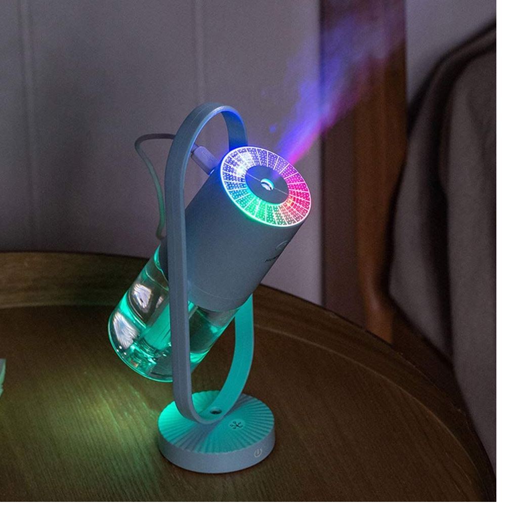 Mini humidificador giratorio con lampara de proyeccion